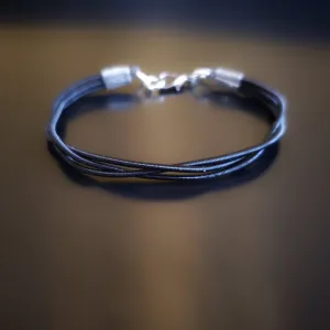 Black braided Harp String Clasp Style Bracelet