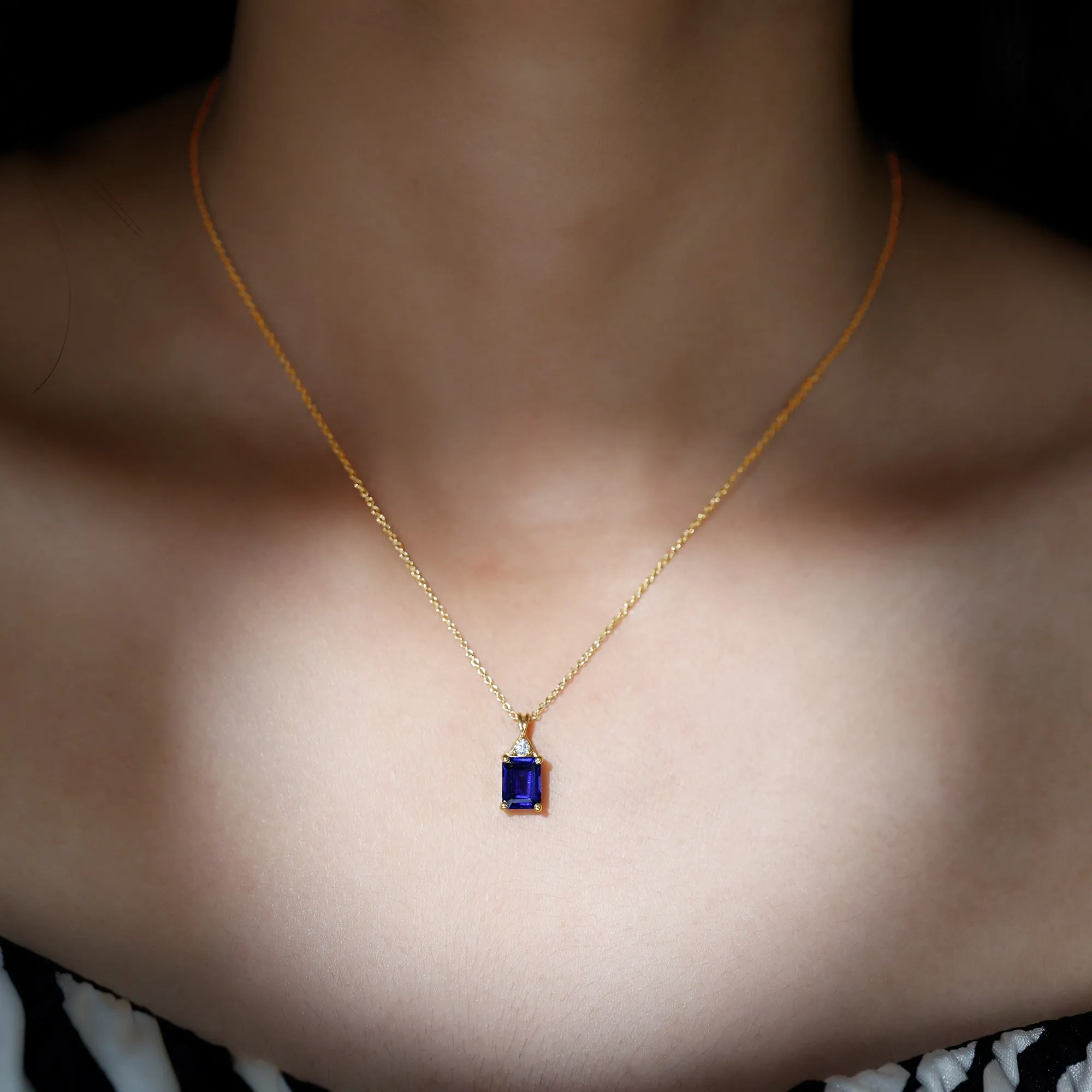 Emerald Cut Created Blue Sapphire Solitaire Pendant with Moissanite