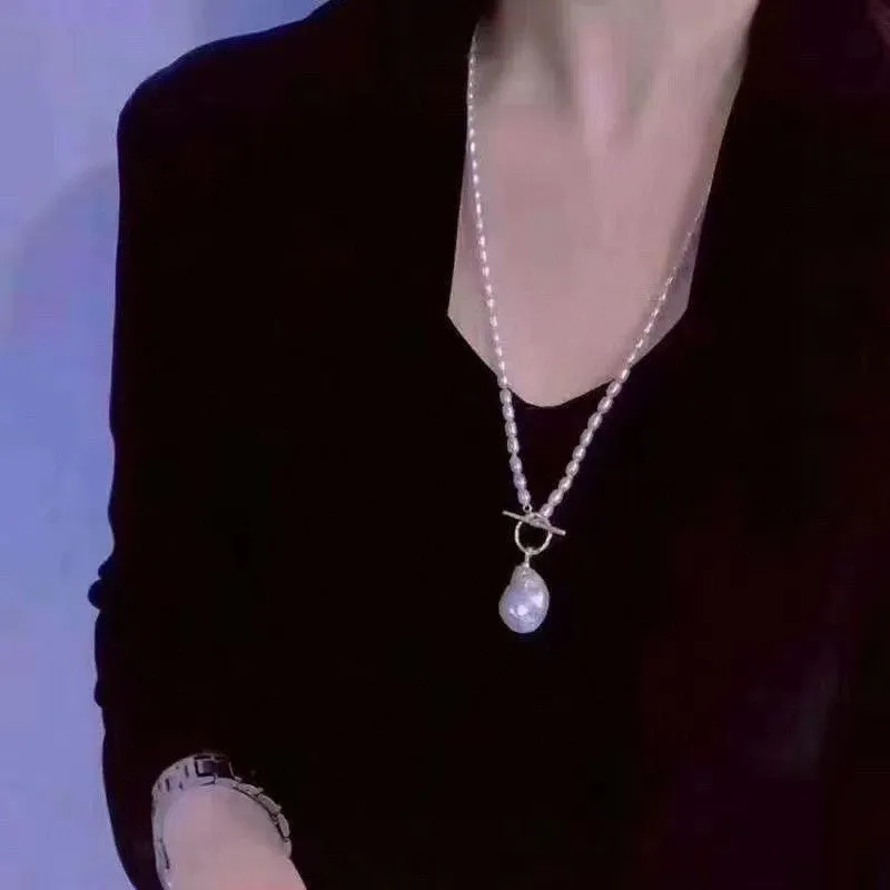 Natural pearl necklace with unique baroque pendant